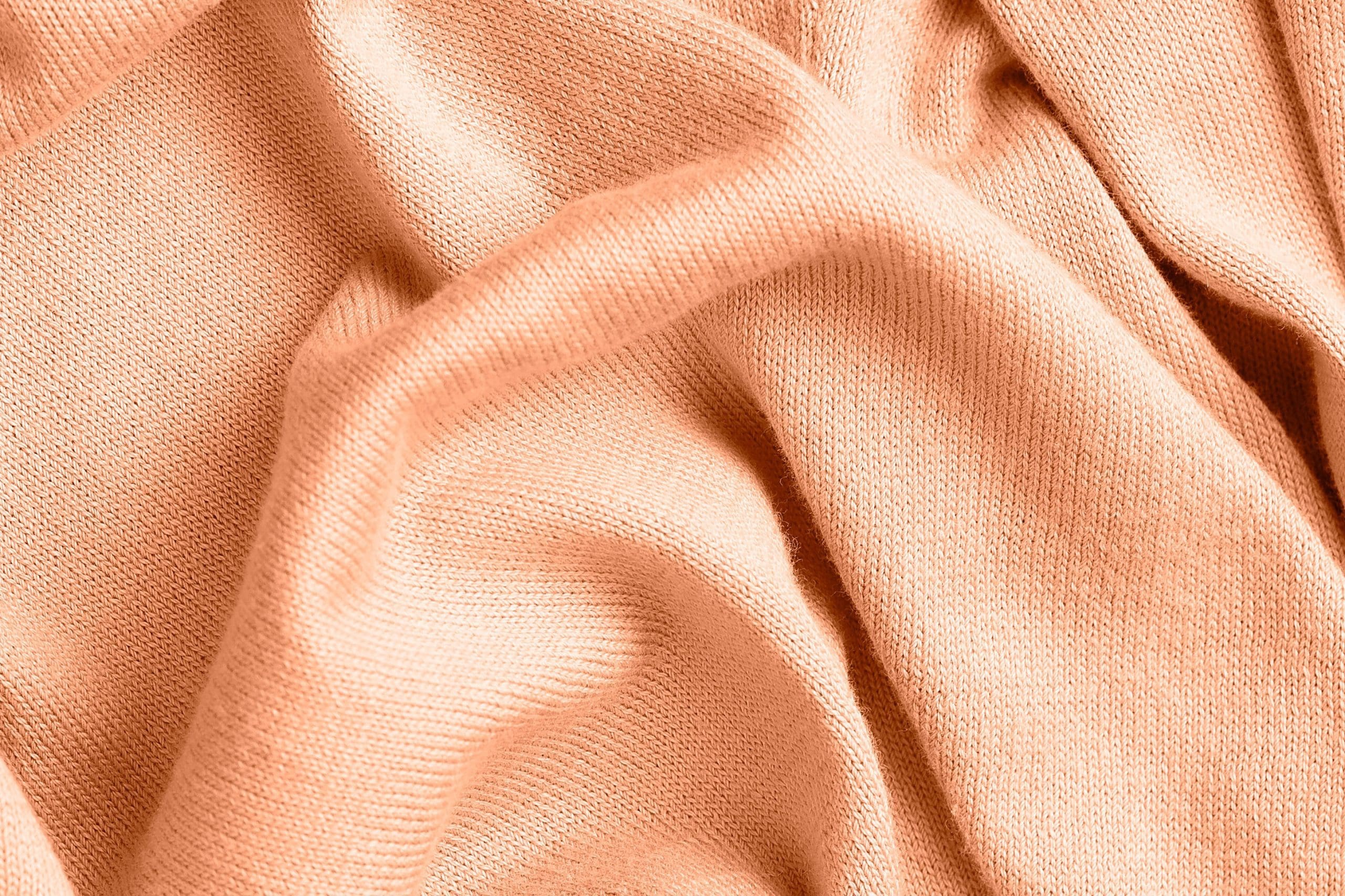 Peach Fuzz - Pantone Color of the Year 2024, symbolising 418's vibrant rebranding.
